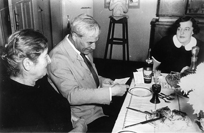 1958 Boris reading congratulatory telegrams about the Nobel Prize, with his wife Zinaida (on the right) and Nina Tabidze